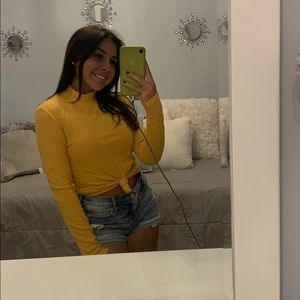 yellow striped turtle neck with knot